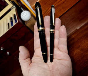 Two similar pens of different sizes